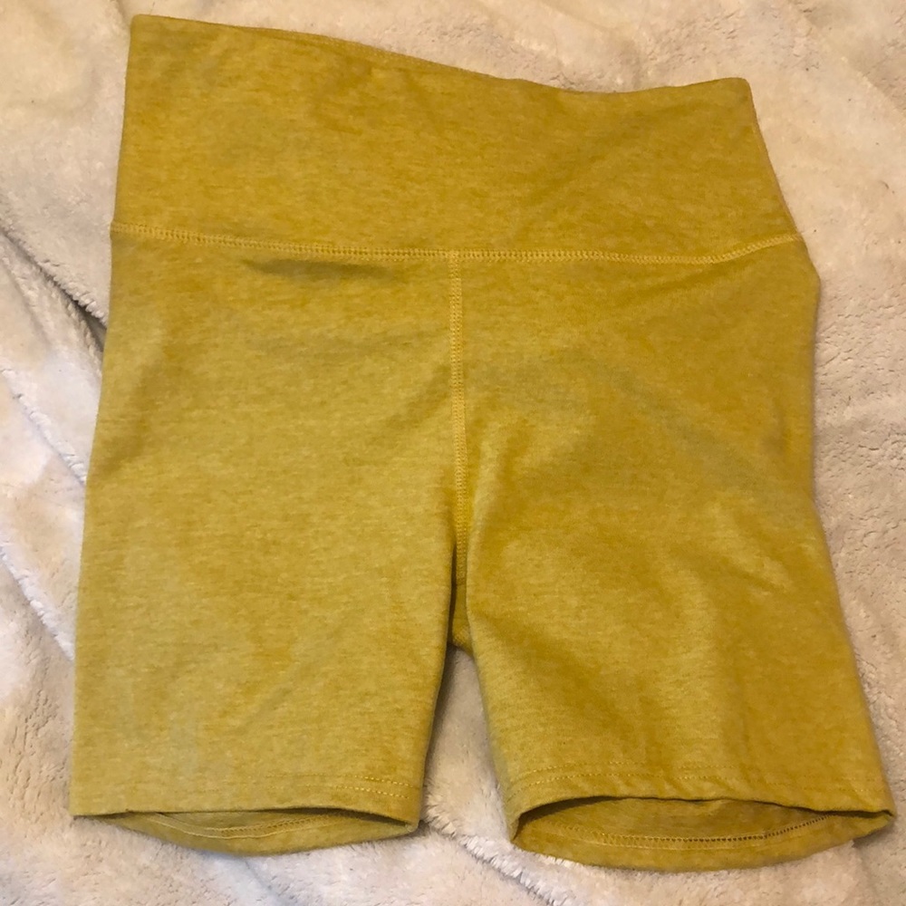 Yellow comfortable workout shorts.